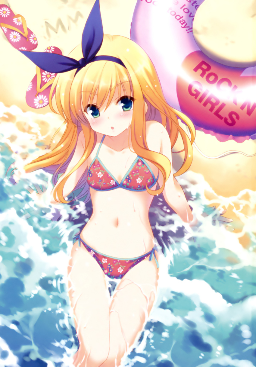 1girl :o arm_support bare_shoulders beach bikini blonde_hair blush female flat_chest floral_print from_above green_eyes hair_ribbon hairband highres innertube isurugi_mio long_hair looking_up mm! navel ocean official_art open_mouth partially_submerged print_bikini qp:flapper ribbon sand scan side-tie_bikini sitting solo swimsuit thigh_gap water wet