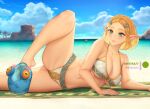 1girl alluring artist_name beach beach_mat bikini blonde_hair chuchu_(zelda) cleavage gluteal_fold green_eyes horizontal_pupils knee_up lying mystra77 navel nintendo ocean on_side palm_tree patreon_username pointy_ears princess_zelda rock short_hair slime_(creature) smile stomach swimsuit the_legend_of_zelda the_legend_of_zelda:_tears_of_the_kingdom thighs tree