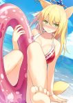 1girl animal_ears bad_id barefoot beach bikini blonde_hair blush cccpo earrings feet female green_eyes hair_ornament highres innertube jewelry legs long_hair ocean original sky solo swimsuit tail toes water wavy_mouth