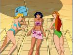 alex_(totally_spies) beach bikini black_hair blonde_hair blue_swimsuit clover_(totally_spies) dark_skin green_bikini green_swimsuit lying non-nude older older_female on_back on_side pink_swimsuit red_hair sam_(totally_spies) screenshot swimsuit totally_spies young_adult young_adult_female young_adult_woman